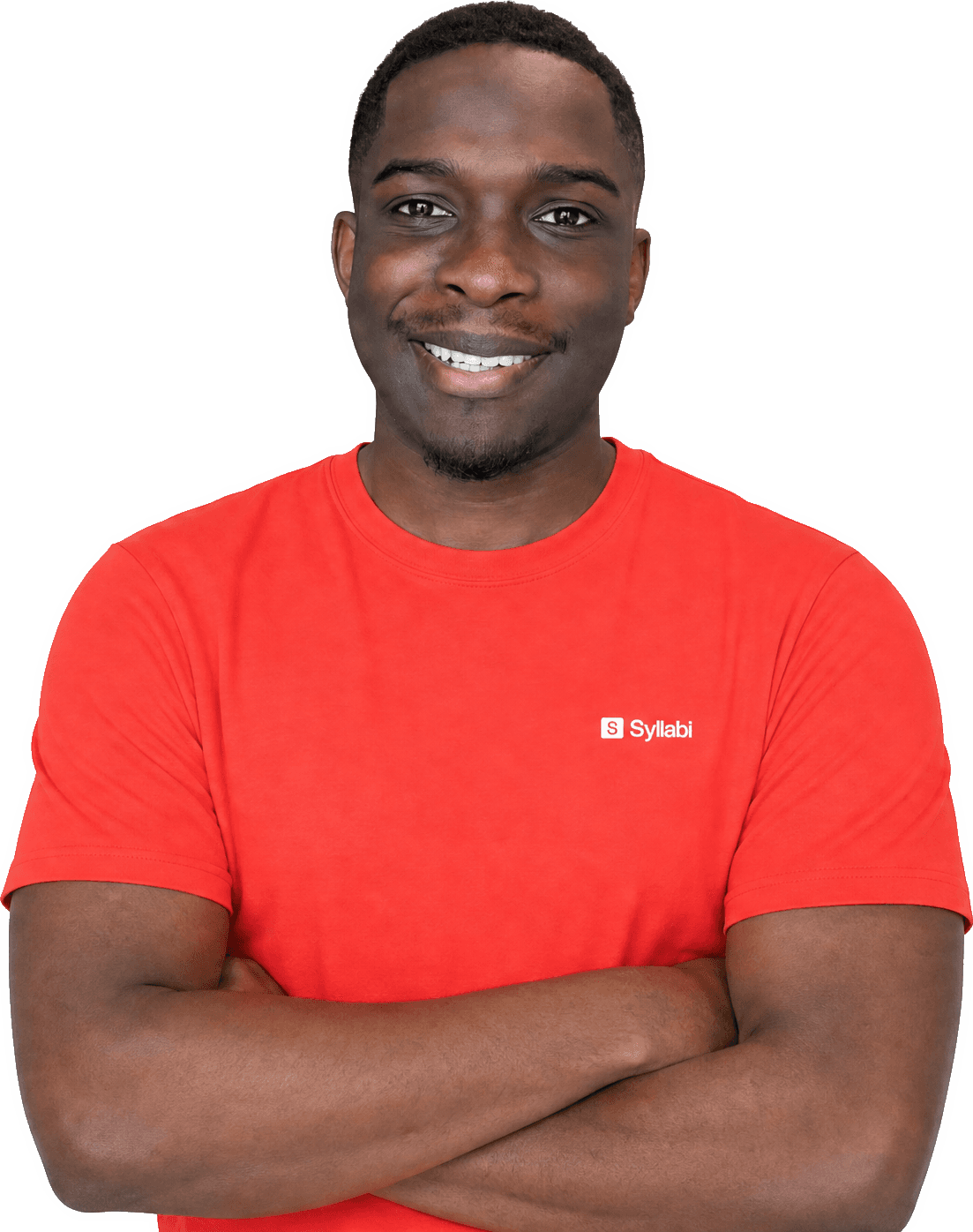 Mr. Tomisin, arms folded, wearing a Syllabi T-shirt